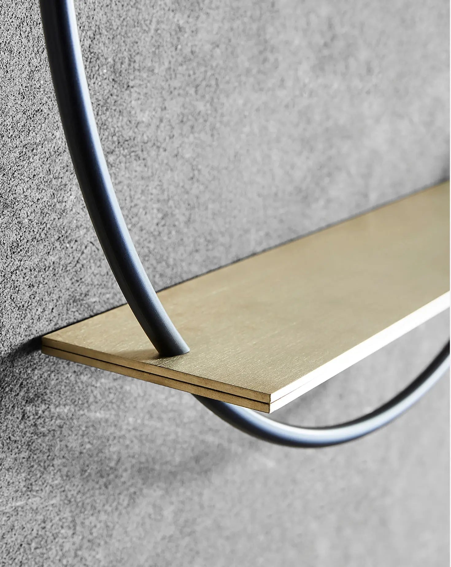 Minimalist brass display stand